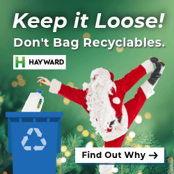 santa putting plastic jug in recycling cart